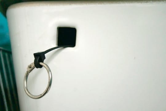 Fix a broken toilet handle using zip ties and a key ring