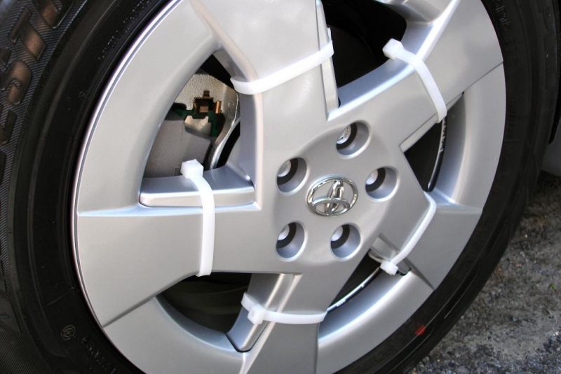 Never lose a hubcap again by securing them with zip ties