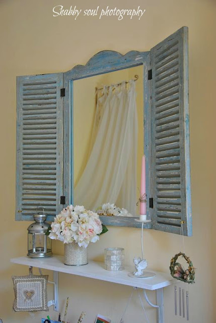 Add shutters to a mirror for an extra touch of flair