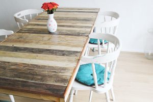 Turn an Old Door and Pallets Into a Big Dining Table