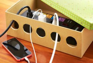 Neatly conceal your power cord in a shoebox